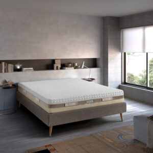 Matelas Camaiore San Lorenzo dans une chambre au lit en tissu gris